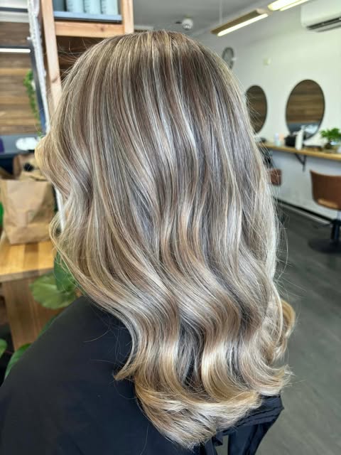 A bright blended blonde refresh at Serenity Hair & Beauty